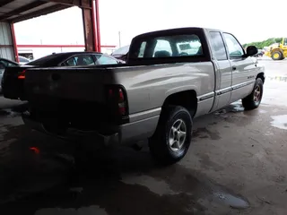 1999 Dodge 1500 with VIN 3B7HC13Y7XG183162, listed as a IAAI auction lot 42111930 with 396,192 mi miles. Bid and sale history available at carsss.com. Image 4.