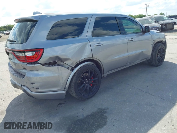 2018 Dodge Durango SRT with VIN 1C4SDJGJ6JC366644, listed as a IAAI auction lot 41906182 with 54,490 mi miles and . Bid and sale history available at DreamBid. Image 4.