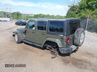 2015 Jeep Wrangler Unlimited Altitude z VIN 1C4HJWEG0FL752152, wystawiony jako IAAI lot #42311043 z przebiegiem 112 379 mil mil oraz . Historia ofert i sprzedaży dostępna na DreamBid. Obrazek 3.
