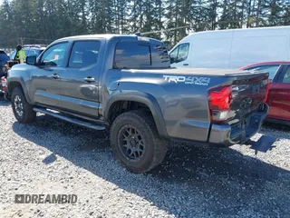 2019 Toyota Tacoma SR z VIN 3TMCZ5AN9KM232882, wystawiony jako IAAI lot #41879314 z przebiegiem Nie podano mil oraz . Historia ofert i sprzedaży dostępna na DreamBid. Obrazek 3.
