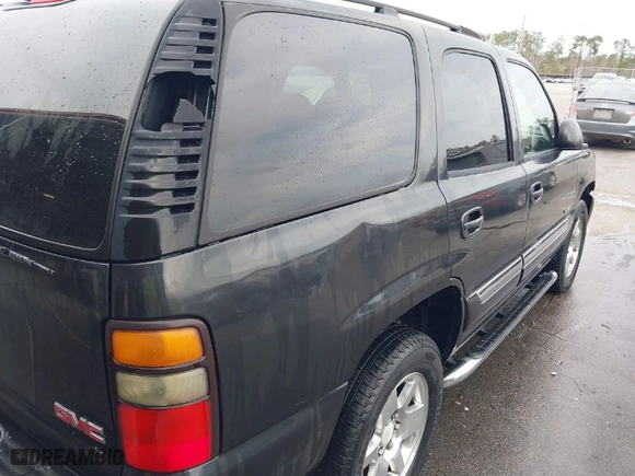 2005 GMC Yukon SLT with VIN 1GKEC13T75R144645, listed as a IAAI auction lot 41703999 with 222,585 mi miles. Bid and sale history available at carsss.com. Image 6.