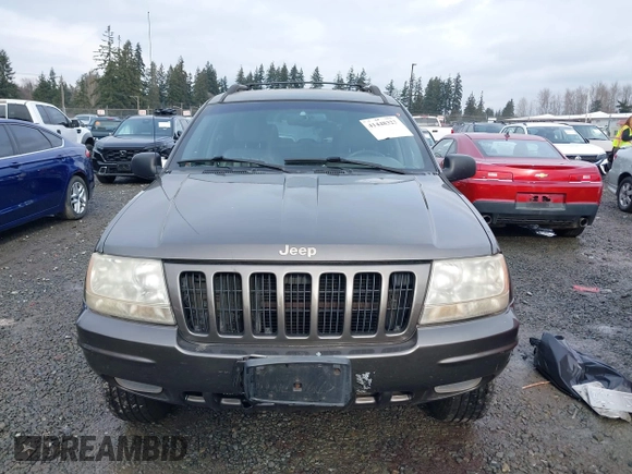 1999 Jeep Grand Cherokee Limited with VIN 1J4GW68N7XC739479, listed as a IAAI auction lot 41448323 with 129,840 mi miles. Bid and sale history available at carsss.com. Image 12.