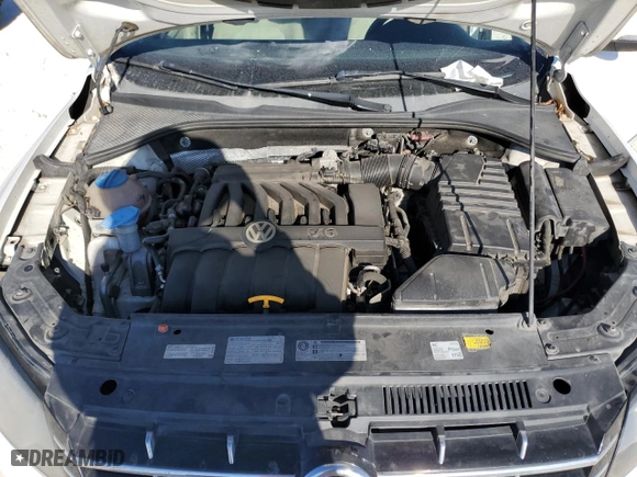 2013 Volkswagen Passat SEL Premium with VIN 1VWCM7A32DC063332, listed as a Copart auction lot 77217544 with 104,534 mi miles and Salvage Title. Bid and sale history available at carsss.com. Image 11.