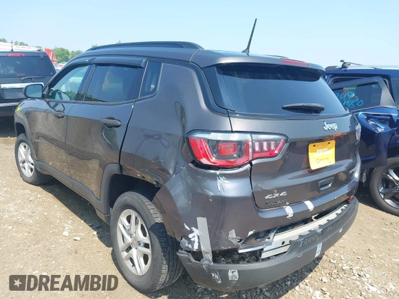 2018 Jeep Compass Sport with VIN 3C4NJDAB7JT235218, listed as a IAAI auction lot 42473771 with 106,302 mi miles and . Bid and sale history available at DreamBid. Image 3.