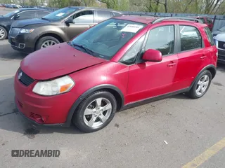 2012 Suzuki SX4 Crossover with VIN JS2YB5A3XC6302115, listed as a IAAI auction lot 42058201 with 113,700 mi miles. Bid and sale history available at carsss.com. Image 2.