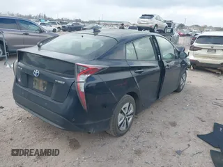 2017 Toyota Prius Two with VIN JTDKBRFU2H3052287, listed as a IAAI auction lot 41507689 with 82,205 mi miles and . Bid and sale history available at carsss.com. Image 4.