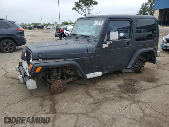 2002 Jeep Wrangler Sport z VIN 1J4FA49S22P763189, wystawiony jako Copart lot #57650295 z przebiegiem 197 383 mil mil oraz Czysty tytuł • Clean title. Historia ofert i sprzedaży dostępna na DreamBid. Obrazek 1.