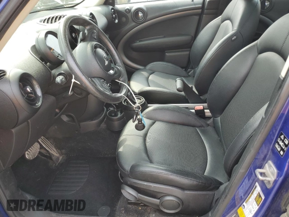 2016 MINI Countryman S with VIN WMWZC5C59GWU02414, listed as a Copart auction lot 59950285 with 106,151 mi miles and Salvage title. Bid and sale history available at DreamBid. Image 7.
