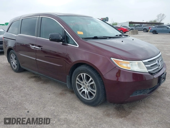 2012 Honda Odyssey EX-L with VIN 5FNRL5H61CB108301, listed as a IAAI auction lot 41939536 with 225,476 mi miles and . Bid and sale history available at DreamBid. Image 1.