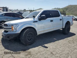 2018 Ford F-150 XL with VIN 1FTEW1CB2JKD72386, listed as a Copart auction lot 52130985 with 154,173 mi miles and Salvage Title. Bid and sale history available at carsss.com. Image 1.