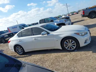 2016 Infiniti Q50 3.0t Premium with VIN JN1EV7AP8GM306347, listed as a IAAI auction lot 42013538 with 199,065 mi miles. Bid and sale history available at carsss.com. Image 13.
