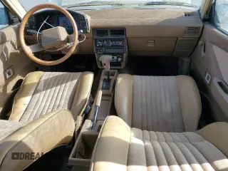 1985 Toyota Tercel z VIN JT2AL32WXF0198845, wystawiony jako Copart lot #79567594 z przebiegiem 84 298 mil mil oraz Czysty tytuł • Clean title. Historia ofert i sprzedaży dostępna na DreamBid. Obrazek 8.