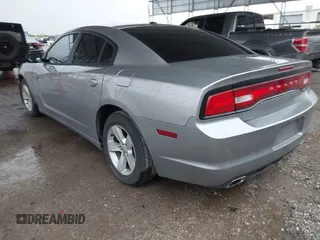 2014 Dodge Charger SE with VIN 2C3CDXBG5EH363292, listed as a IAAI auction lot 41888279 with 129,128 mi miles. Bid and sale history available at carsss.com. Image 3.
