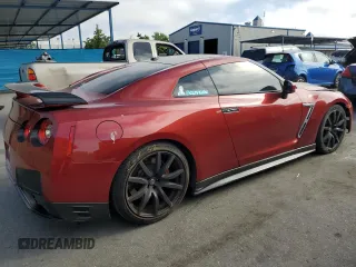 2015 Nissan GT-R Premium z VIN JN1AR5EF9FM280350, wystawiony jako Copart lot #58313634 z przebiegiem 83 387 mil mil oraz Szkody całkowita. Historia ofert i sprzedaży dostępna na DreamBid. Obrazek 3.