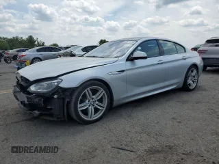 2015 BMW 6 Series 640i xDrive z VIN WBA6B8C53FD453229, wystawiony jako Copart lot #60371214 z przebiegiem 116 624 mil mil oraz Szkoda całkowita • Salvage title. Historia ofert i sprzedaży dostępna na DreamBid. Obrazek 1.