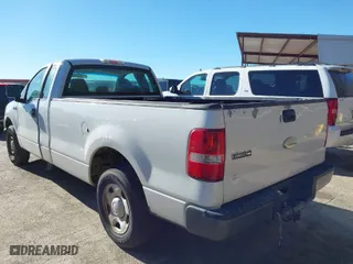 2007 Ford F-150 XL with VIN 1FTRF12W87KC81895, listed as a IAAI auction lot 41214873 with 231,058 mi miles. Bid and sale history available at carsss.com. Image 3.