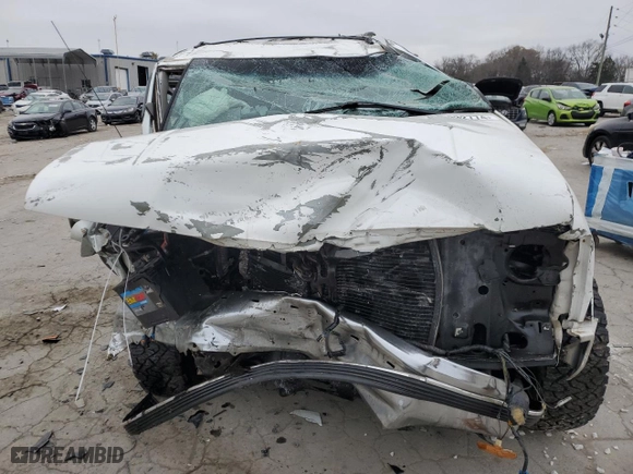 1999 Chevrolet Tahoe with VIN 3GNEK18R7XG230110, listed as a Copart auction lot 82932774 with 148,055 mi miles and Salvage Title. Bid and sale history available at carsss.com. Image 5.