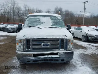 2011 Ford Econoline Cargo Commercial with VIN 1FTNE1EWXBDA35585, listed as a IAAI auction lot 41349320 with 122,311 mi miles and . Bid and sale history available at carsss.com. Image 12.
