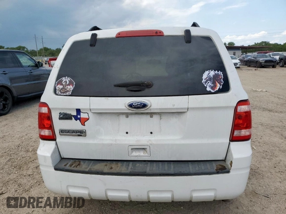 2011 Ford Escape XLT z VIN 1FMCU9D77BKB26159, wystawiony jako Copart lot #59211745 z przebiegiem 252 374 mil mil oraz Szkoda całkowita • Salvage title. Historia ofert i sprzedaży dostępna na DreamBid. Obrazek 6.