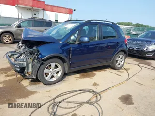 2011 Suzuki SX4 Crossover with VIN JS2YB5A38B6301589, listed as a IAAI auction lot 40112766 with 128,323 mi miles. Bid and sale history available at carsss.com. Image 2.
