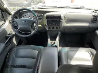 2004 Ford Explorer Sport Trac XLS with VIN 1FMZU67K24UB65144, listed as a Copart auction lot 52611305 with 211,806 mi miles and Salvage title. Bid and sale history available at DreamBid. Image 8.