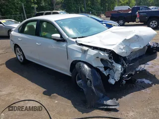 2013 Volkswagen Passat SE with VIN 1VWBH7A35DC032589, listed as a IAAI auction lot 42374770 with 143,323 mi miles and . Bid and sale history available at DreamBid. Image 1.