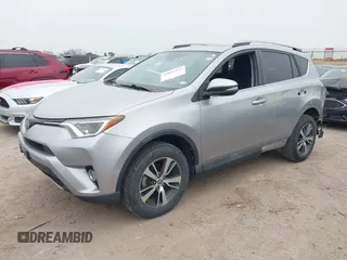 2018 Toyota RAV4 XLE с VIN 2T3WFREV0JW409842, выставлен на аукционе IAAI как лот 42057521 с пробегом 145 915 миль миль и . История ставок и продаж доступна на DreamBid. Изображение 18.