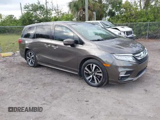 2020 Honda Odyssey Elite with VIN 5FNRL6H91LB030294, listed as a IAAI auction lot 41608291 with 74,477 mi miles and . Bid and sale history available at DreamBid. Image 1.