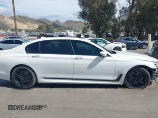 2017 BMW 7 Series 750i with VIN WBA7F0C32HGM22273, listed as a IAAI auction lot 41857151 with 90,518 mi miles and . Bid and sale history available at carsss.com. Image 13.
