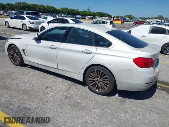 2015 BMW 4 Series 428i with VIN WBA4A5C58FGK15335, listed as a IAAI auction lot 41723243 with 152,652 mi miles and . Bid and sale history available at DreamBid. Image 3.