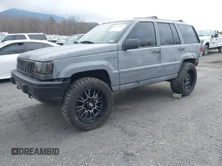 1995 Jeep Grand Cherokee Laredo with VIN 1J4GZ58S4SC778322, listed as a IAAI auction lot 41498800 with 255,058 mi miles. Bid and sale history available at carsss.com. Image 2.