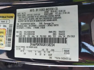 2016 Ford Fusion Titanium with VIN 3FA6P0K9XGR158234, listed as a IAAI auction lot 42043716 with 161,164 mi miles. Bid and sale history available at carsss.com. Image 9.