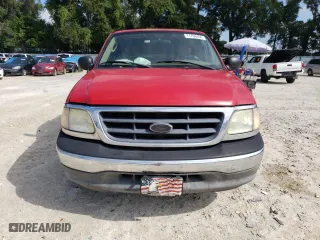 2003 Ford F-150 XL with VIN 1FTRX07WX3KD51374, listed as a Copart auction lot 71796464 with 130,319 mi miles and Salvage Title. Bid and sale history available at carsss.com. Image 5.