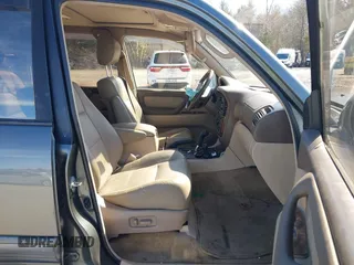 1999 Toyota Land Cruiser with VIN JT3HT05J5X0045784, listed as a IAAI auction lot 41886919 with 505,121 mi miles. Bid and sale history available at carsss.com. Image 5.