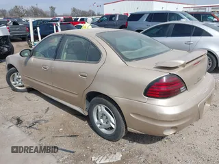 2003 Pontiac Grand Am SE with VIN 1G2NE52F73C171244, listed as a IAAI auction lot 41572797 with 5 mi miles. Bid and sale history available at carsss.com. Image 3.