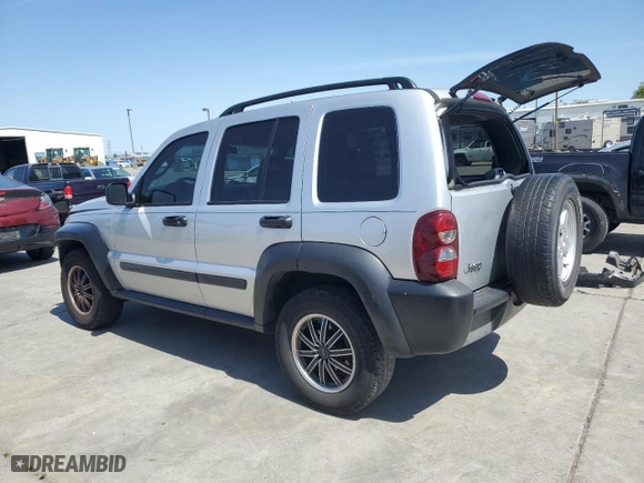 2005 Jeep Liberty Sport with VIN 1J4GK48K95W682154, listed as a Copart auction lot 52176155 with 164,743 mi miles and Salvage Title. Bid and sale history available at carsss.com. Image 2.