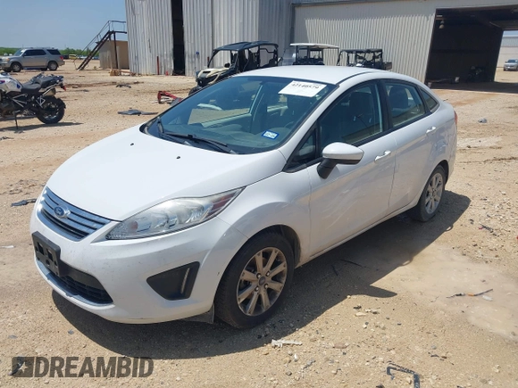 2012 Ford Fiesta SE with VIN 3FADP4BJ8CM161701, listed as a IAAI auction lot 42140579 with 59,496 mi miles. Bid and sale history available at carsss.com. Image 2.