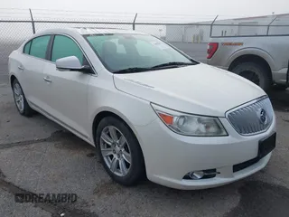 2012 Buick LaCrosse Premium 2 z VIN 1G4GF5E35CF310767, wystawiony jako IAAI lot #42083067 z przebiegiem 143 093 mil mil oraz . Historia ofert i sprzedaży dostępna na DreamBid. Obrazek 1.