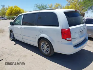 2014 Dodge Grand Caravan SXT with VIN 2C4RDGCG1ER429495, listed as a IAAI auction lot 42058513 with 136,936 mi miles and . Bid and sale history available at DreamBid. Image 3.