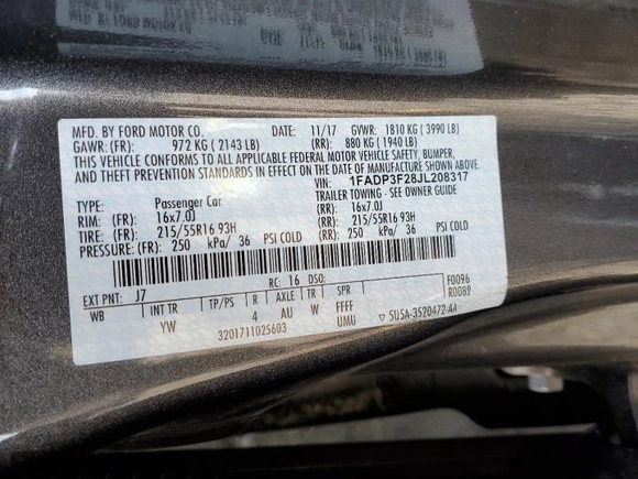 2018 Ford Focus SE with VIN 1FADP3F28JL208317, listed as a Copart auction lot 53976835 with 143,903 mi miles and Clean Title. Bid and sale history available at carsss.com. Image 12.