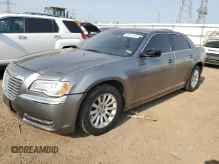 2012 Chrysler 300 z VIN 2C3CCAAG7CH145479, wystawiony jako Copart lot #60516105 z przebiegiem 152 699 mil mil oraz Czysty tytuł • Clean title. Historia ofert i sprzedaży dostępna na DreamBid. Obrazek 1.