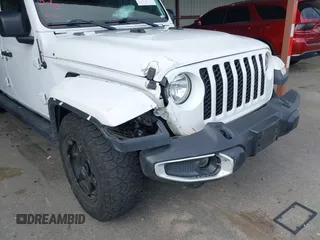 2021 Jeep Gladiator Willys with VIN 1C6HJTAG0ML505674, listed as a IAAI auction lot 42249317 with 60,150 mi miles and . Bid and sale history available at DreamBid. Image 6.