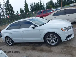 2016 Audi A3 Premium with VIN WAUA7GFFXG1056744, listed as a IAAI auction lot 42527955 with 125,917 mi miles and . Bid and sale history available at DreamBid. Image 13.