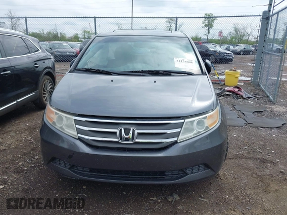 2012 Honda Odyssey EX-L with VIN 5FNRL5H64CB028040, listed as a IAAI auction lot 42126048 with 160,675 mi miles and . Bid and sale history available at DreamBid. Image 12.