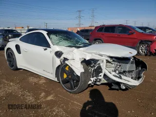 2015 Porsche 911 Turbo S with VIN WP0AD2A9XFS160370, listed as a Copart auction lot 77165054 with 19,235 mi miles and Salvage Title. Bid and sale history available at DreamBid. Image 4.