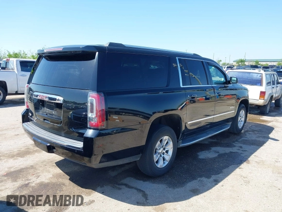 2016 GMC Yukon XL Denali with VIN 1GKS2HKJ2GR111246, listed as a IAAI auction lot 41834364 with 73,418 mi miles. Bid and sale history available at carsss.com. Image 4.