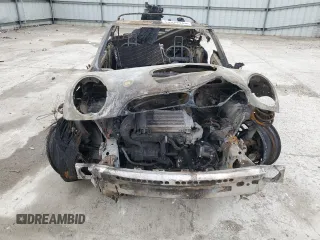 2006 MINI Convertible S with VIN WMWRH33536TK59031, listed as a Copart auction lot 51598825 with Not provided miles and Salvage title. Bid and sale history available at DreamBid. Image 5.