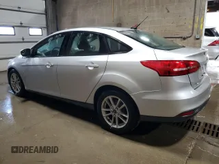 2017 Ford Focus SE with VIN 1FADP3F29HL223970, listed as a Copart auction lot 66022345 with 104,601 mi miles and Clean title. Bid and sale history available at DreamBid. Image 2.