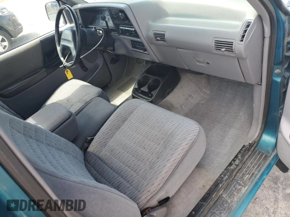 1994 Ford Ranger Splash z VIN 1FTCR11X7RTB12634, wystawiony jako Copart lot #53813435 z przebiegiem 183 609 mil mil oraz Szkoda całkowita • Salvage title. Historia ofert i sprzedaży dostępna na DreamBid. Obrazek 8.