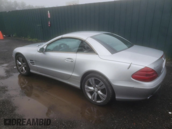 2005 Mercedes-Benz SL 500 with VIN WDBSK75F05F094991, listed as a Copart auction lot 61678705 with 128,123 mi miles and Clean title. Bid and sale history available at DreamBid. Image 2.